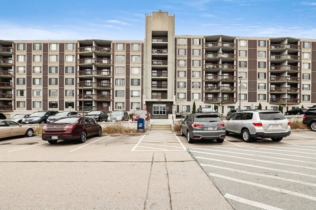 1500 Worcester Road, Unit 710 Framingham, MA 01702 - Photo 3 of 33 a cars parked in front of a building