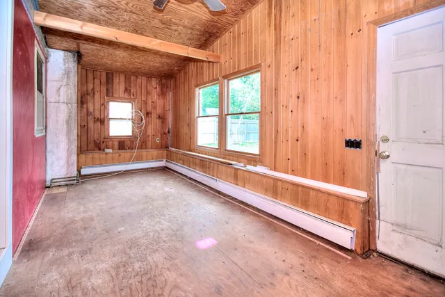 a view of hallway with windows