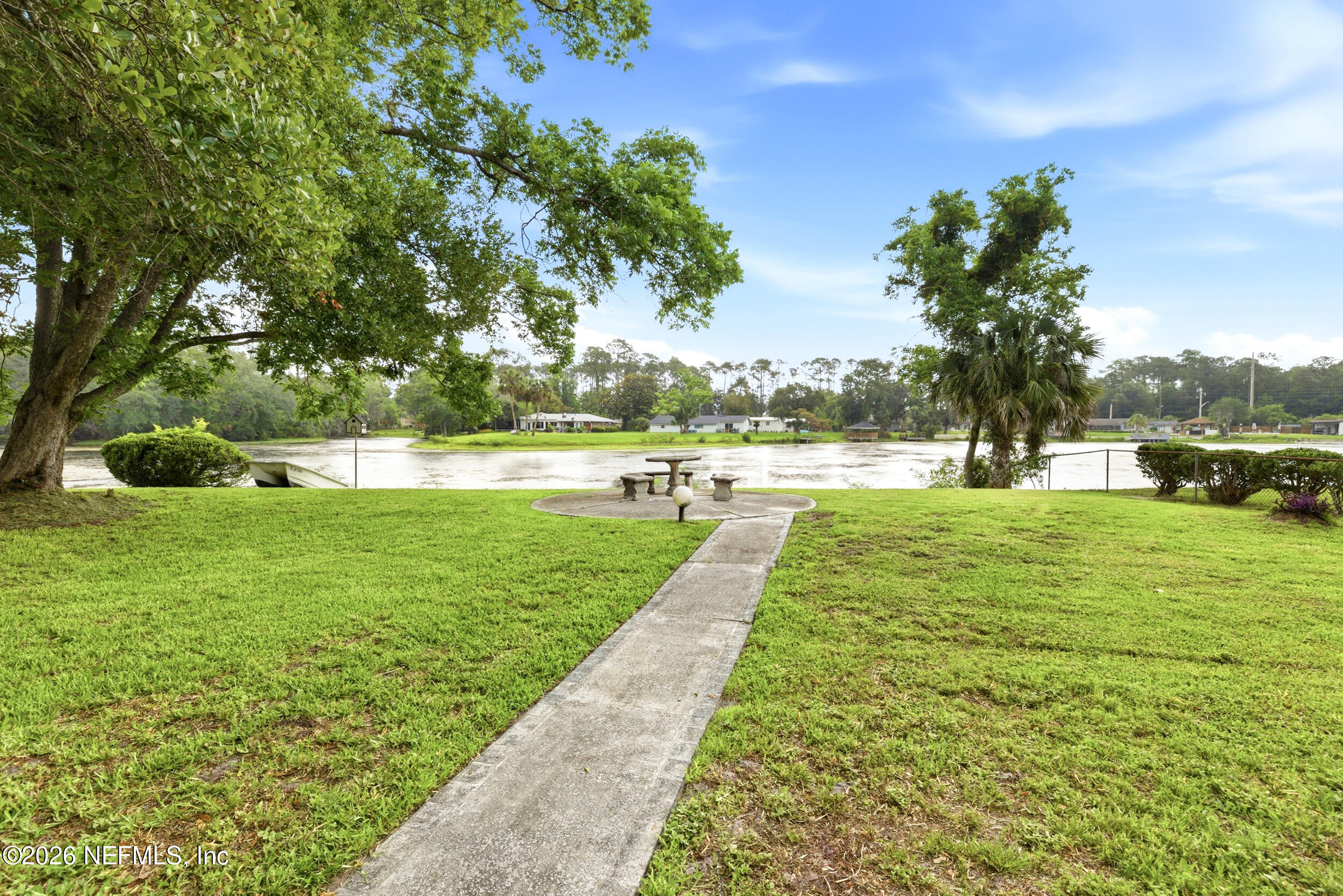 7484 Spinola Road Jacksonville, FL 32217 - Photo 2 of 63 a view of an outdoor space and a yard