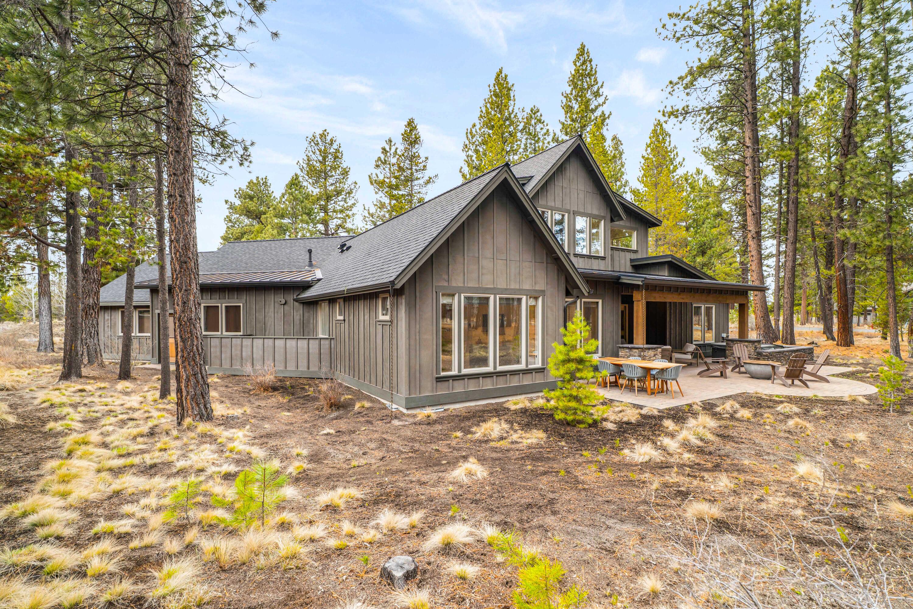 56302 Sable Rock Loop, Unit 255 Bend, OR 97707 - Photo 54 of 65 a front view of a house with a yard