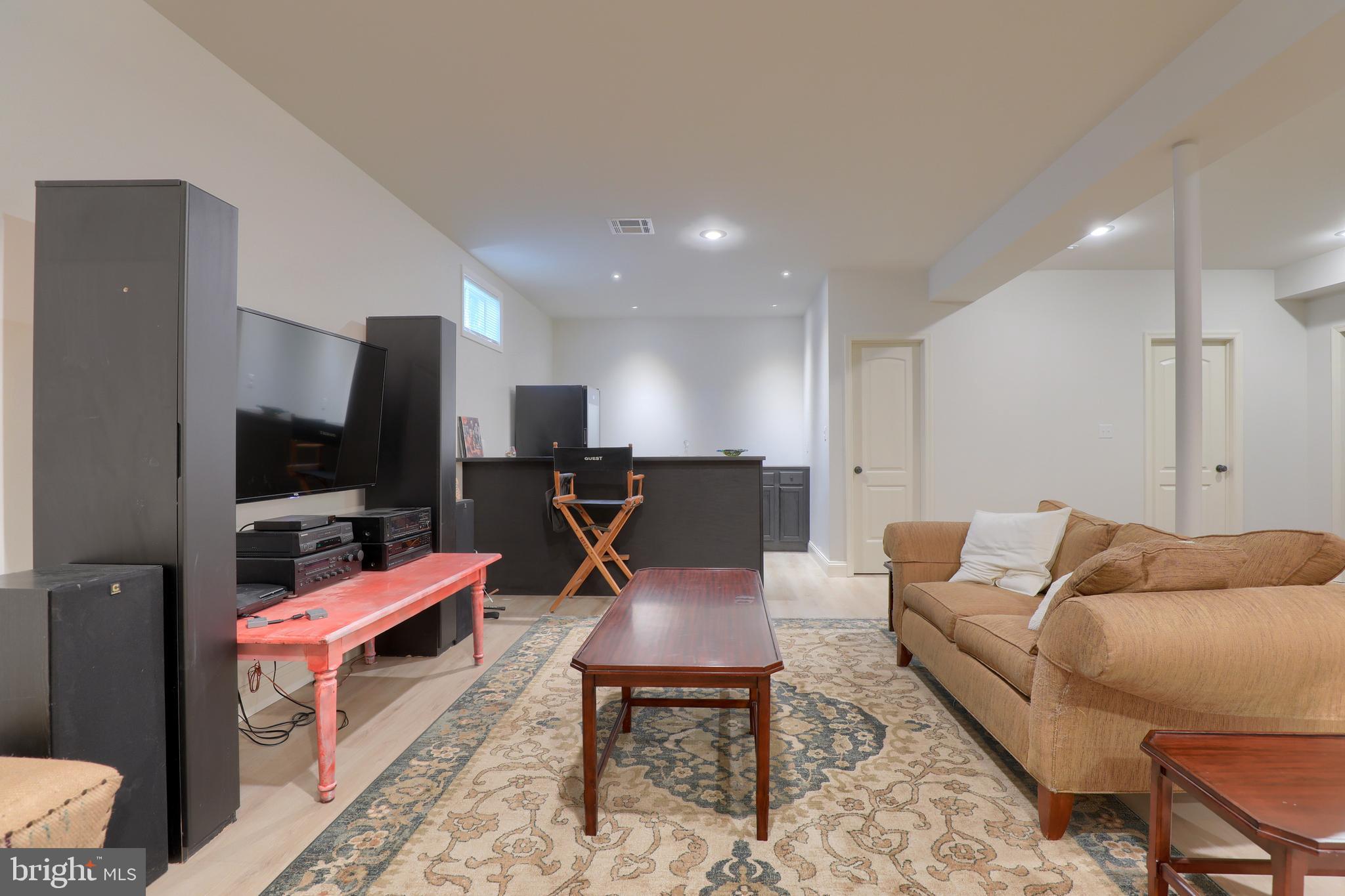 669 Dorset Street Lititz, PA 17543 - Photo 36 of 49 Lower Level Family Room with Bar Area