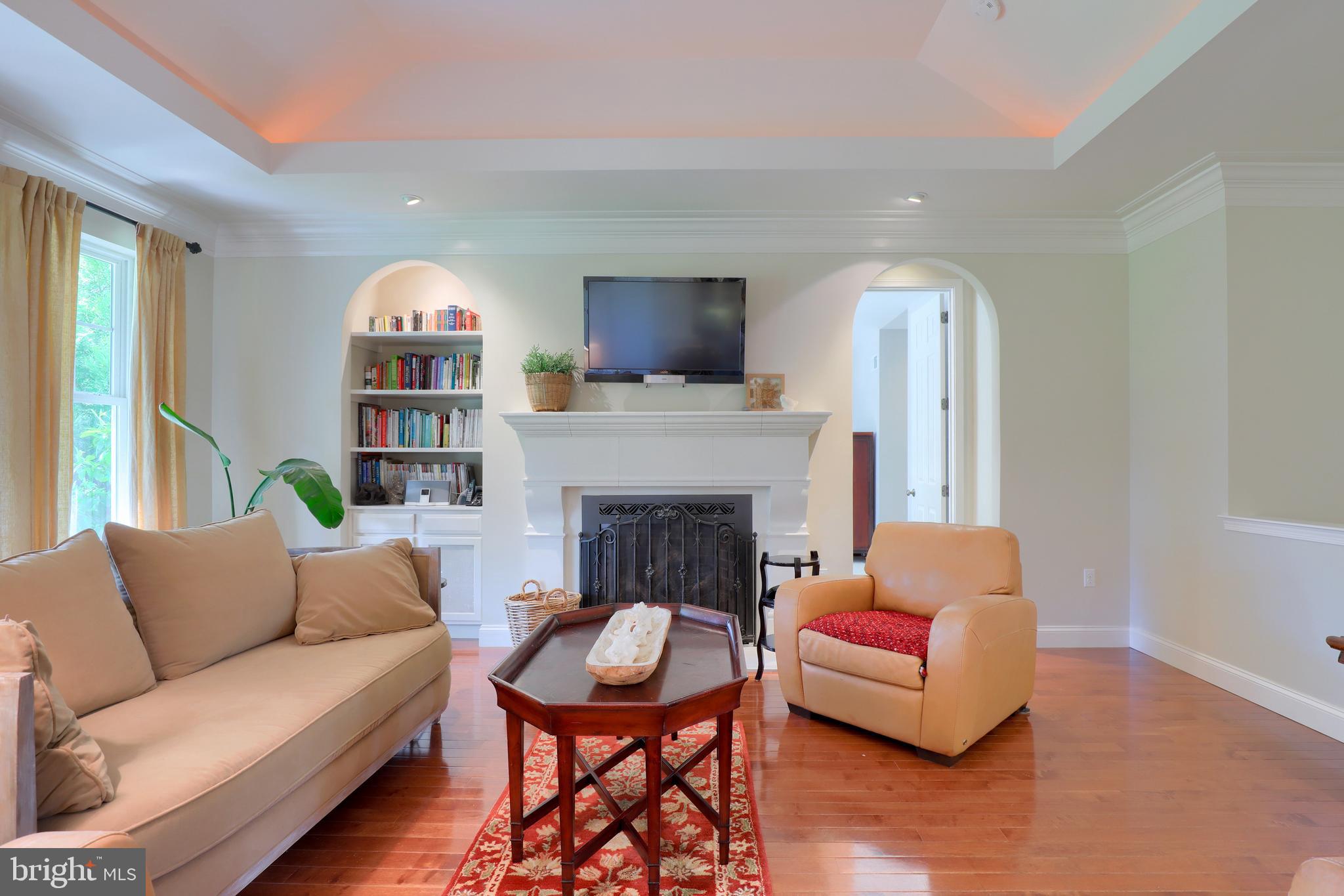 669 Dorset Street Lititz, PA 17543 - Photo 9 of 49 Living Room with Gas Fireplace and Crown Molding