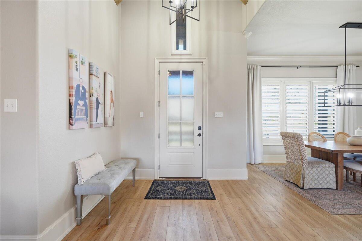 1202 North 14th Place Wolfforth, TX 79382 - Photo 18 of 75 a view of a room with furniture and wooden floor