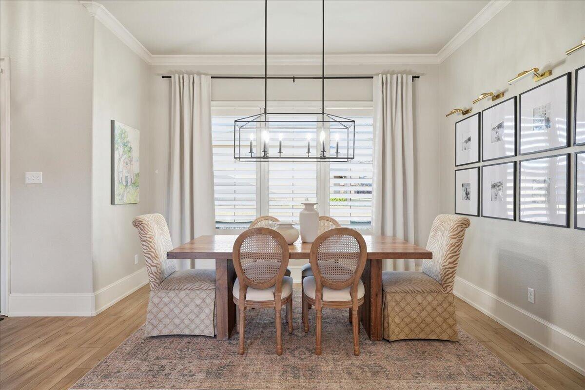 1202 North 14th Place Wolfforth, TX 79382 - Photo 26 of 75 a view of a dining room with furniture window and outside view