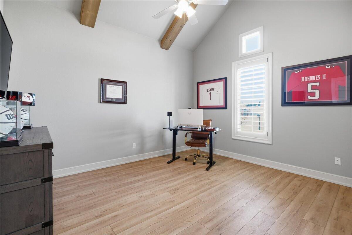 1202 North 14th Place Wolfforth, TX 79382 - Photo 40 of 75 a view of a workspace with furniture and wooden floor