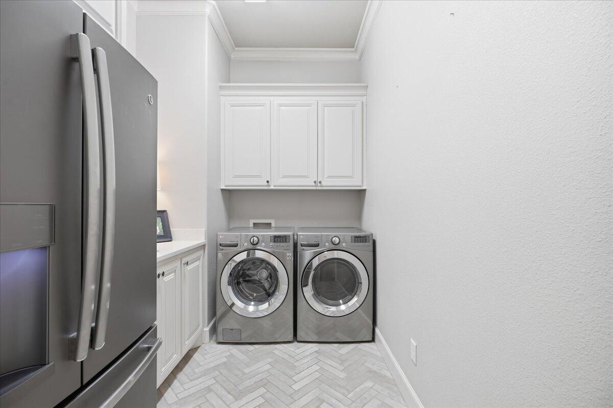 1202 North 14th Place Wolfforth, TX 79382 - Photo 54 of 75 a utility room with dryer and washer