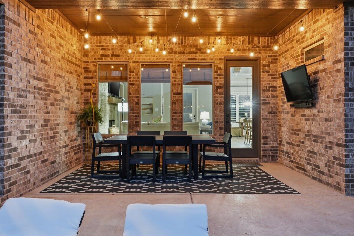 1202 North 14th Place Wolfforth, TX 79382 - Photo 59 of 75 a view of a dining room with furniture