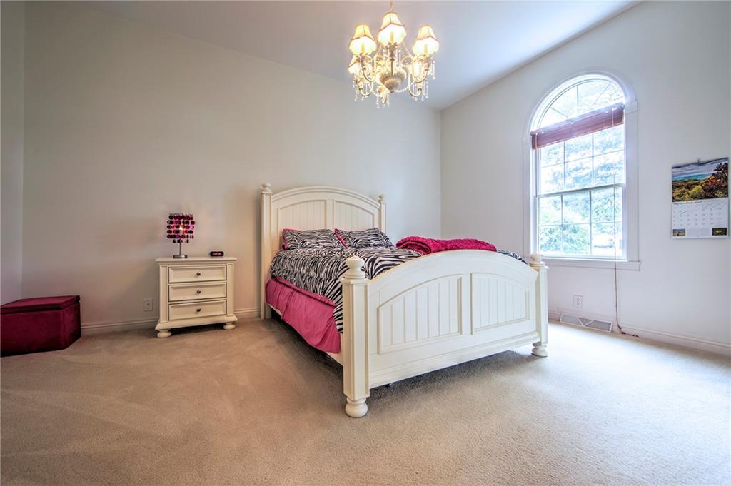 118 Klein Road Cranberry Township, PA 16066 - Photo 15 of 25 16x13 Bedroom 2 has chandelier lighting and access to full bath with walk-in closet.
