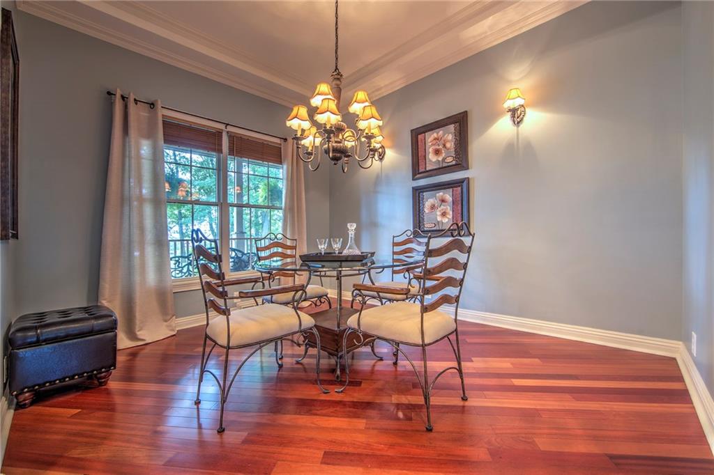 118 Klein Road Cranberry Township, PA 16066 - Photo 5 of 25 12x10 Dining room features 10' ceiling, double crown molding and Brazilian cherry hardwood flooring.