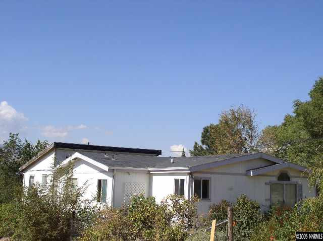 15085 Pinion Drive Reno, NV 89521 - Photo 3 of 5 a view of a house with a outdoor space