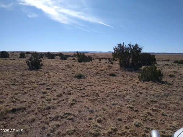 a view of beach and mountain