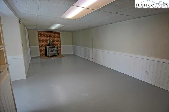 a view of a livingroom with car parked