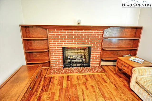 a living room with a rug