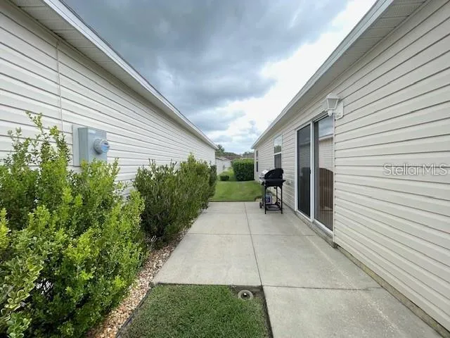 a view of a back yard of the house