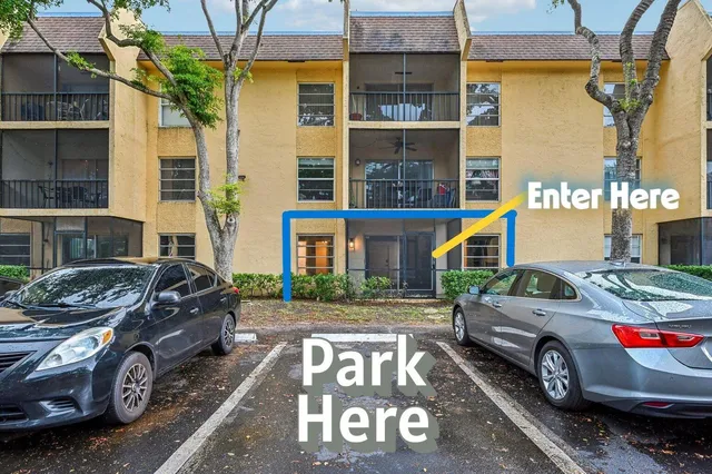 a view of a car parked in front of a house