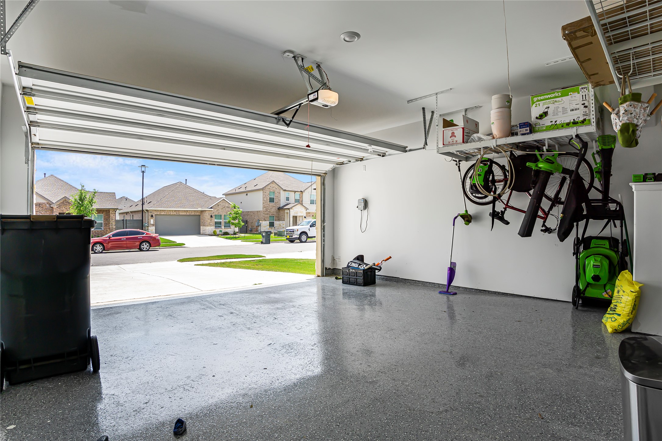 124 Cherry Ridge Road Georgetown, TX 78628 - Photo 20 of 23 Spacious two-car garage with epoxy-coated flooring