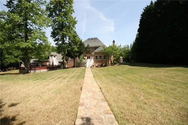 a view of swimming pool with seating area