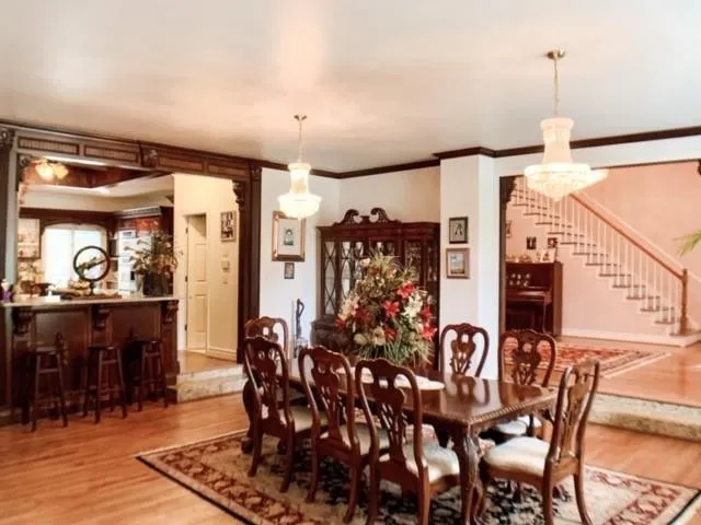 a view of a dining room with furniture