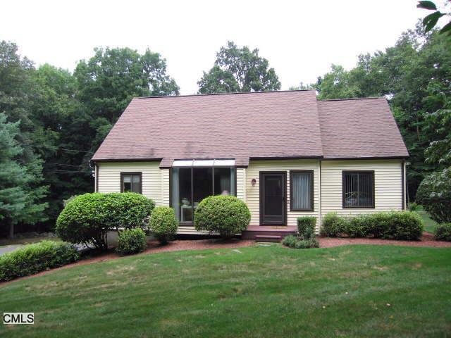 59 Bayberry Hill Road Ridgefield, CT 06877 - Photo 1 of 1 a view of a house with a yard and plants