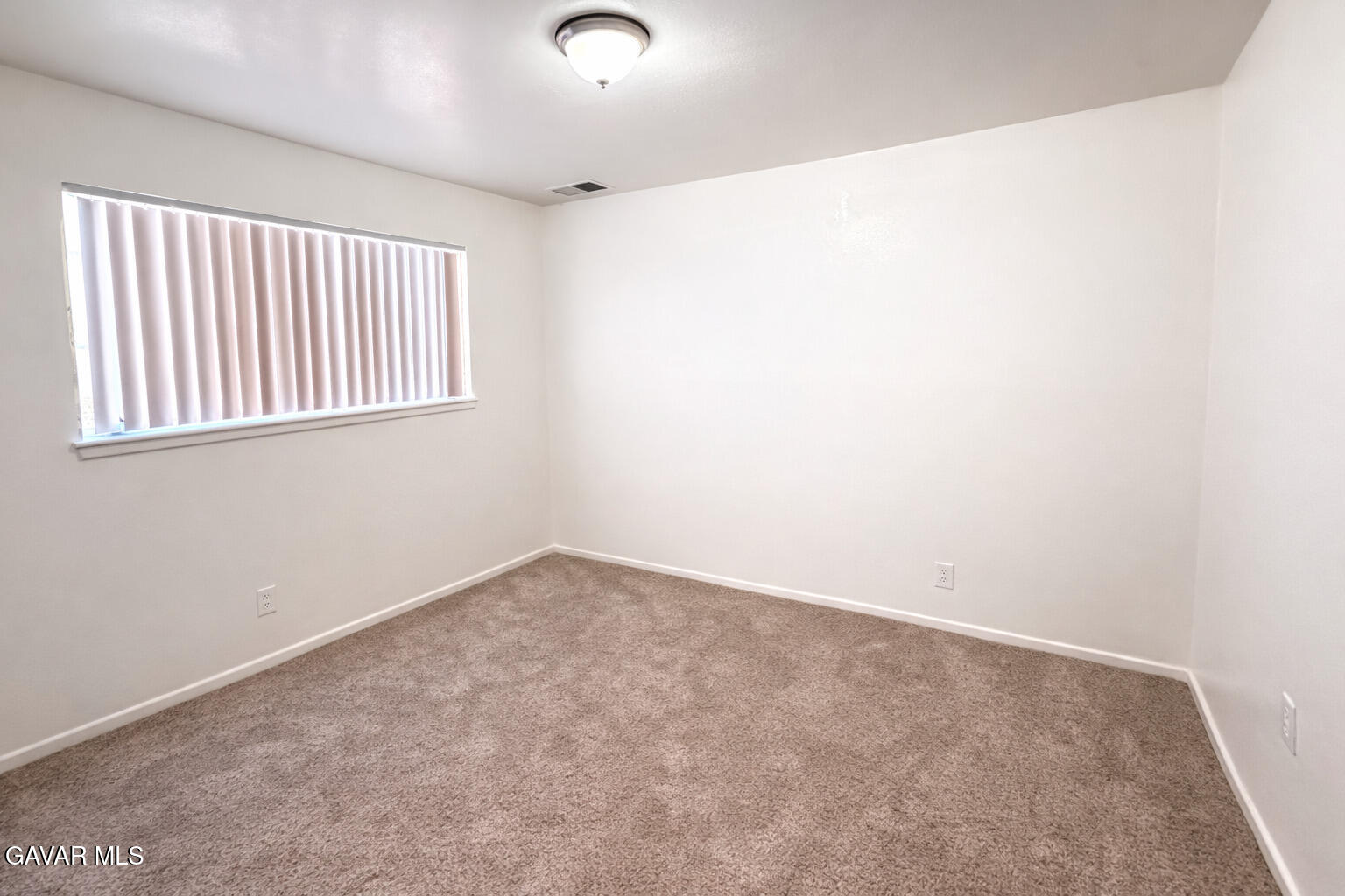 44226 2nd Street East Lancaster, CA 93535 - Photo 23 of 24 an empty room with a window