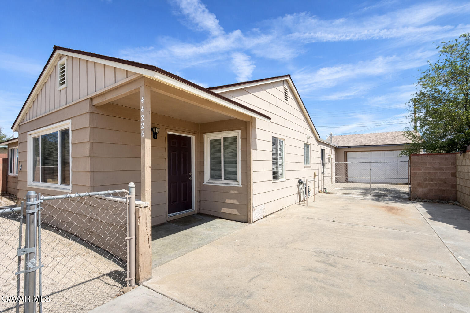 44226 2nd Street East Lancaster, CA 93535 - Photo 3 of 24 a view of a house with backyard and sitting area