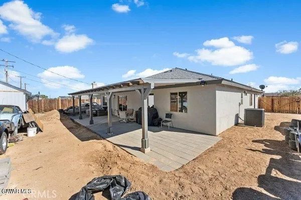 a view of a house with a patio