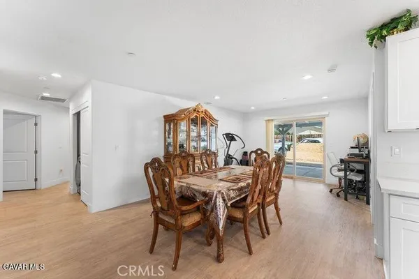 a view of a dining room with furniture