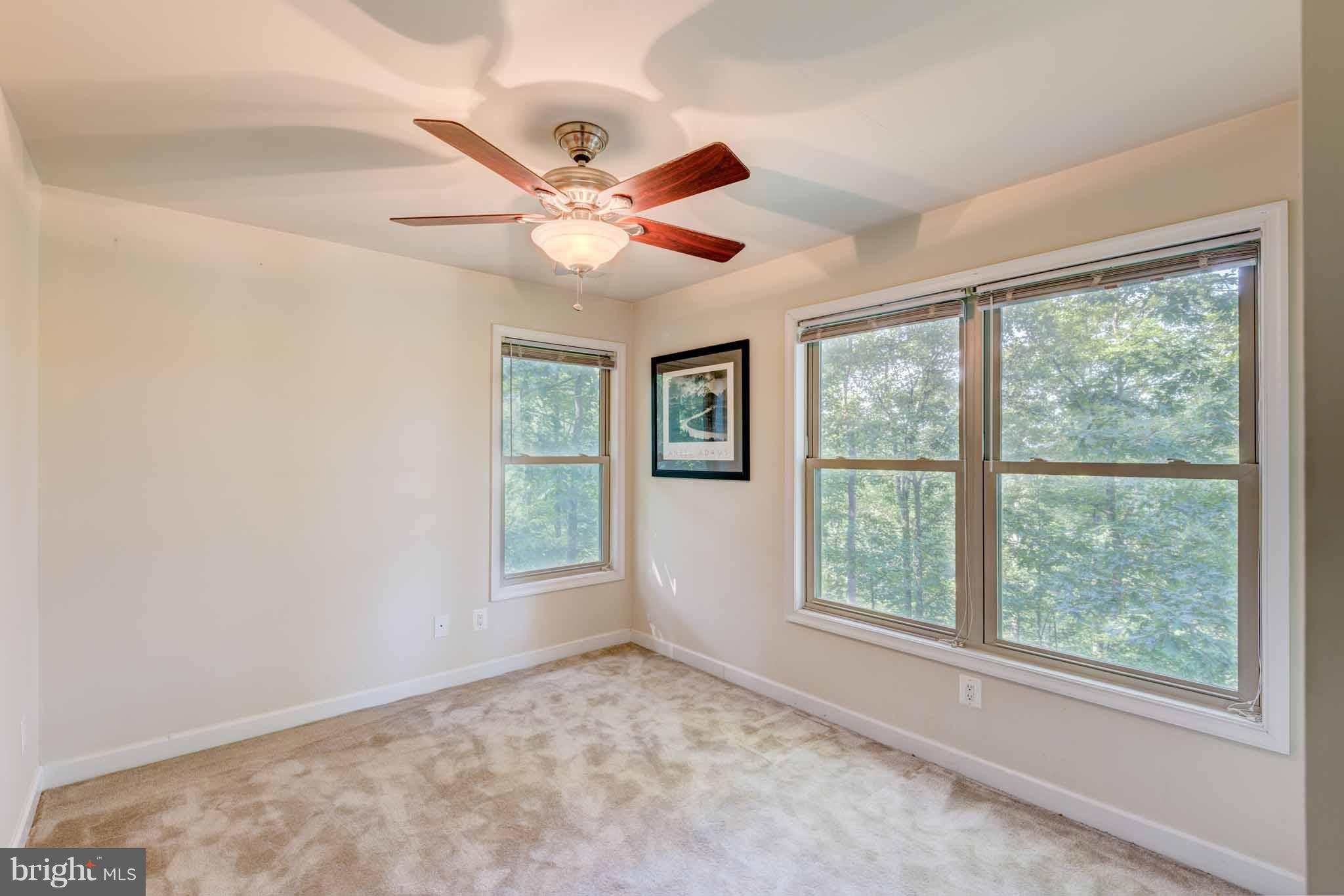 6704 West Lakeridge Road New Market, MD 21774 - Photo 14 of 30 a view of an empty room with a window