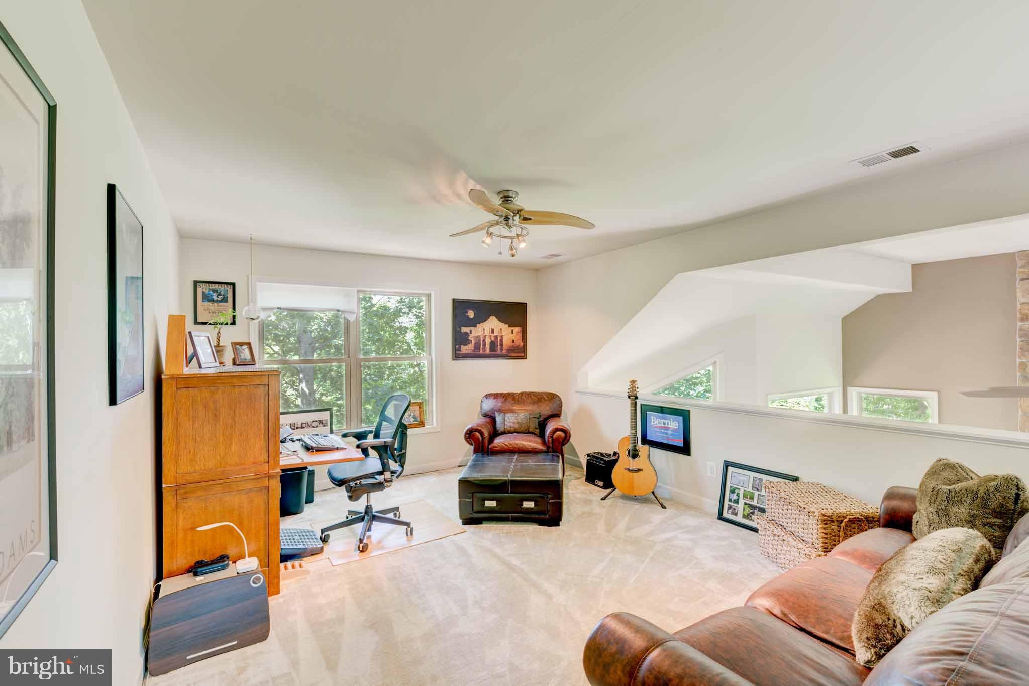 6704 West Lakeridge Road New Market, MD 21774 - Photo 15 of 30 a living room with furniture and a large window