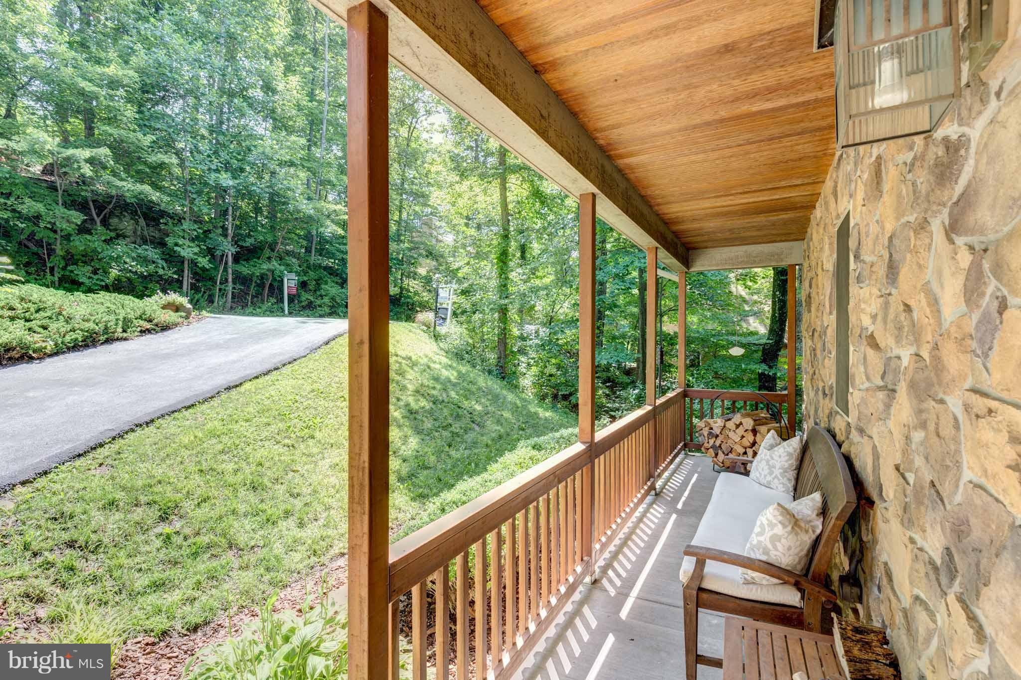6704 West Lakeridge Road New Market, MD 21774 - Photo 26 of 30 a view of a room with wooden floor and outdoor space
