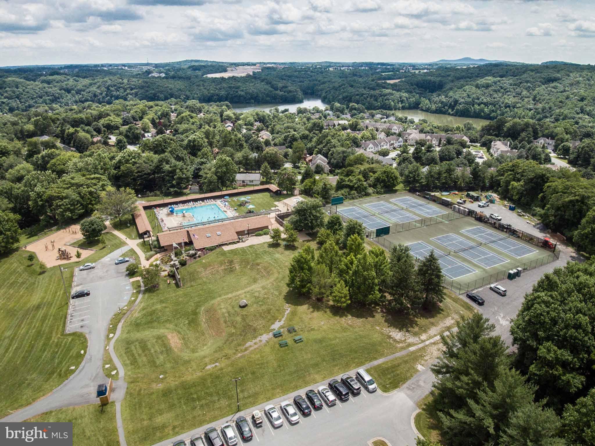 6704 West Lakeridge Road New Market, MD 21774 - Photo 28 of 30 an aerial view of residential houses with outdoor space