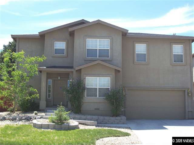 2305 Keystone Avenue Reno, NV 89503 - Photo 1 of 1 a front view of a house with garden