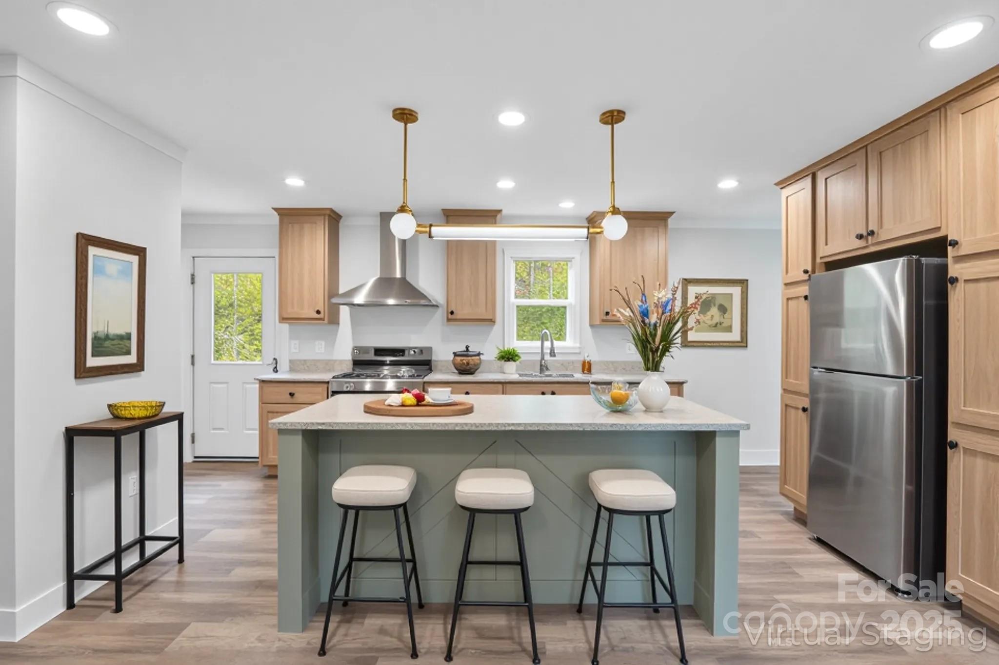 237 Hickory Nut Ridge Road, Unit 10 Burnsville, NC 28714 - Photo 12 of 42 a kitchen with stainless steel appliances a stove a refrigerator a sink and a refrigerator