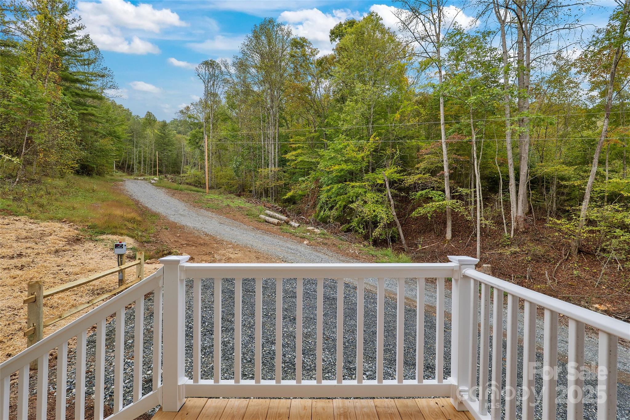 237 Hickory Nut Ridge Road, Unit 10 Burnsville, NC 28714 - Photo 18 of 42 a view of a balcony