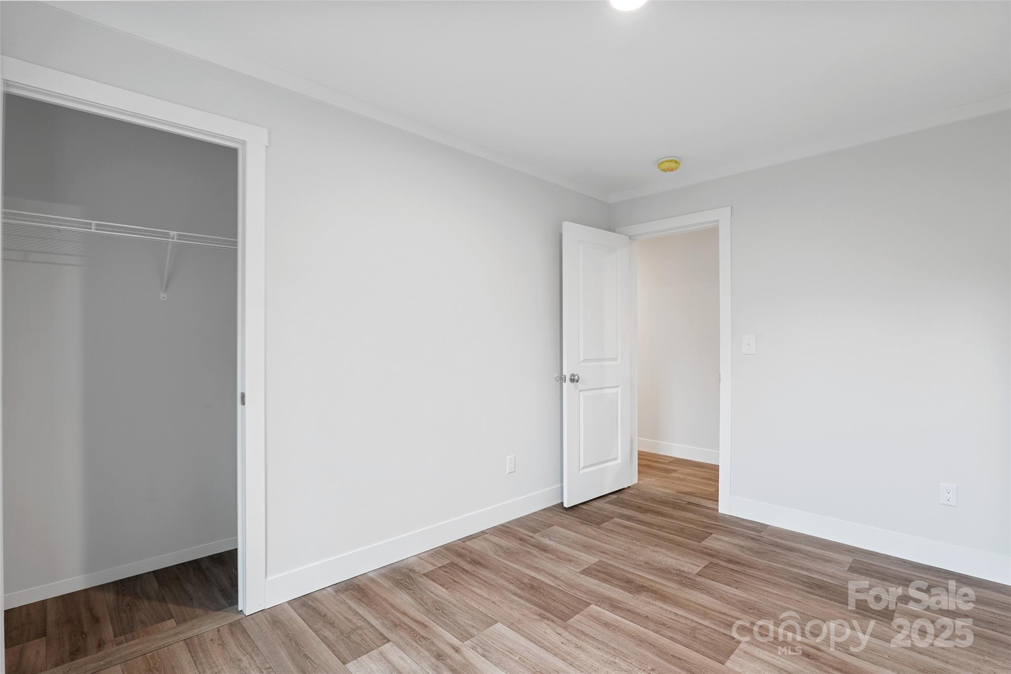 237 Hickory Nut Ridge Road, Unit 10 Burnsville, NC 28714 - Photo 23 of 42 a view of an empty room