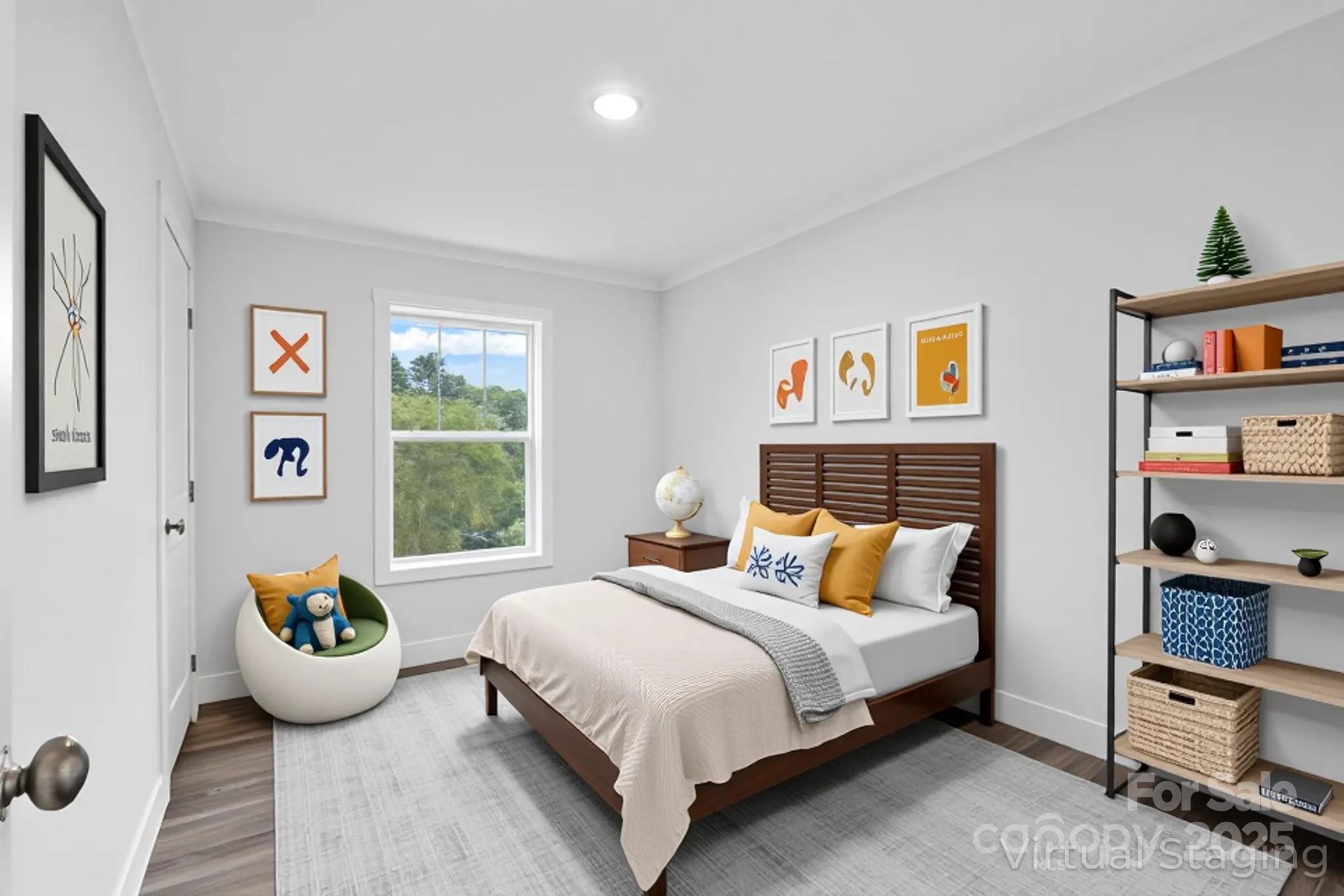 237 Hickory Nut Ridge Road, Unit 10 Burnsville, NC 28714 - Photo 26 of 42 a bedroom with bed and a large window