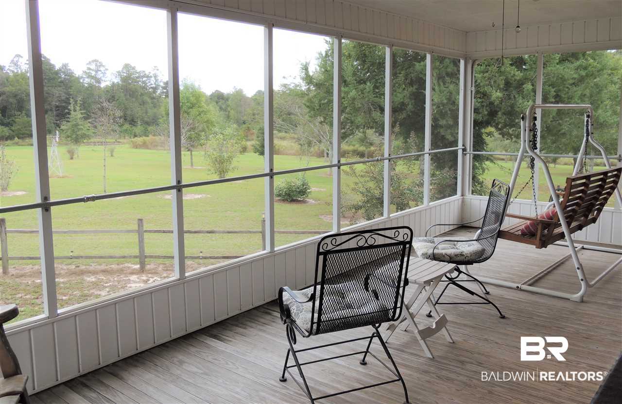 722 Shoffner Street Brewton, AL 36426 - Photo 37 of 38 Relax on the screened in porch