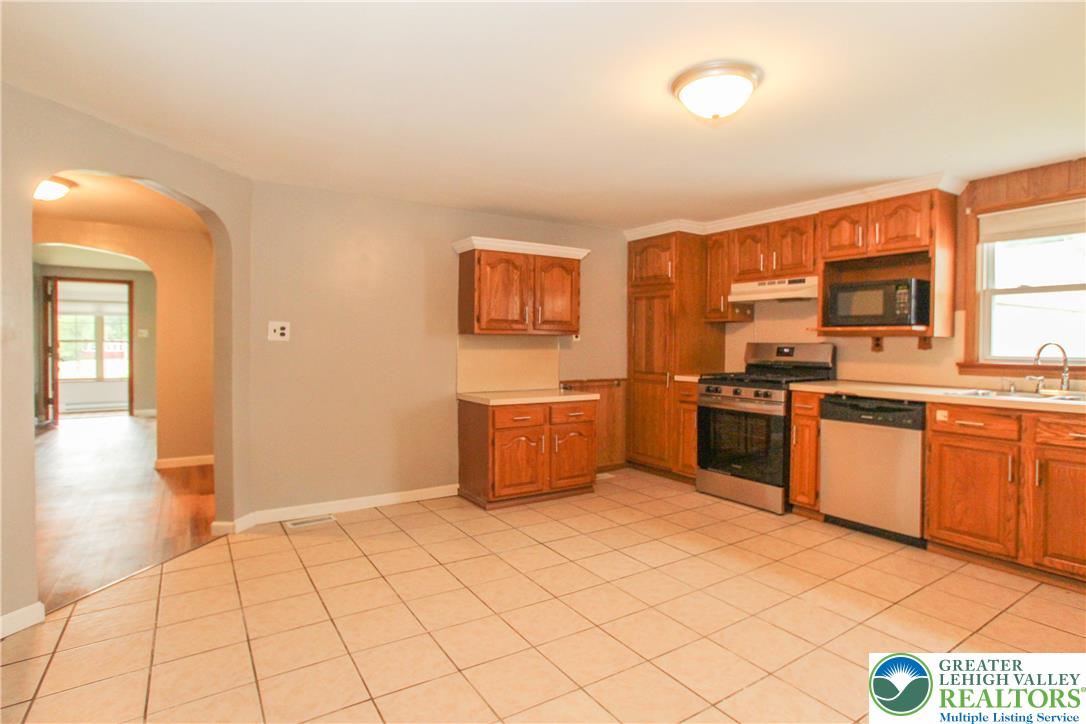 492 Filetown Road Nazareth, PA 18064 - Photo 21 of 30 A well-equipped kitchen featuring hardwood cabinetry and stainless steel appliances.