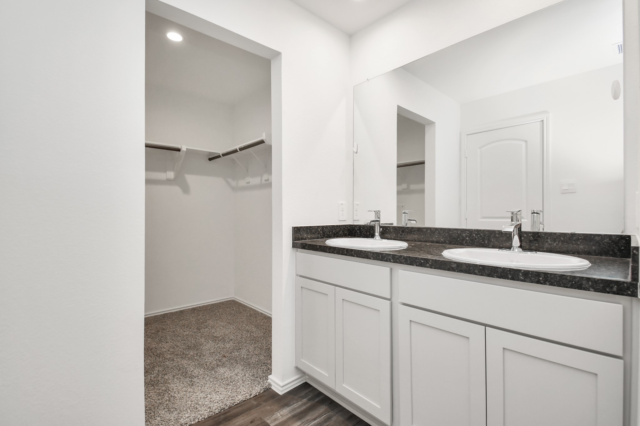 5315 Castlebury Meadows Dr Spring Spring, TX 77373 - Photo 31 of 39 a bathroom with a sink and a mirror