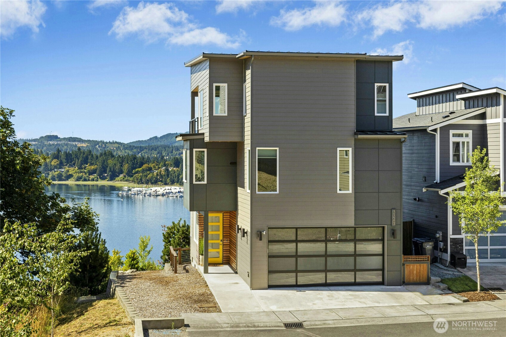 front view of a house with a yard