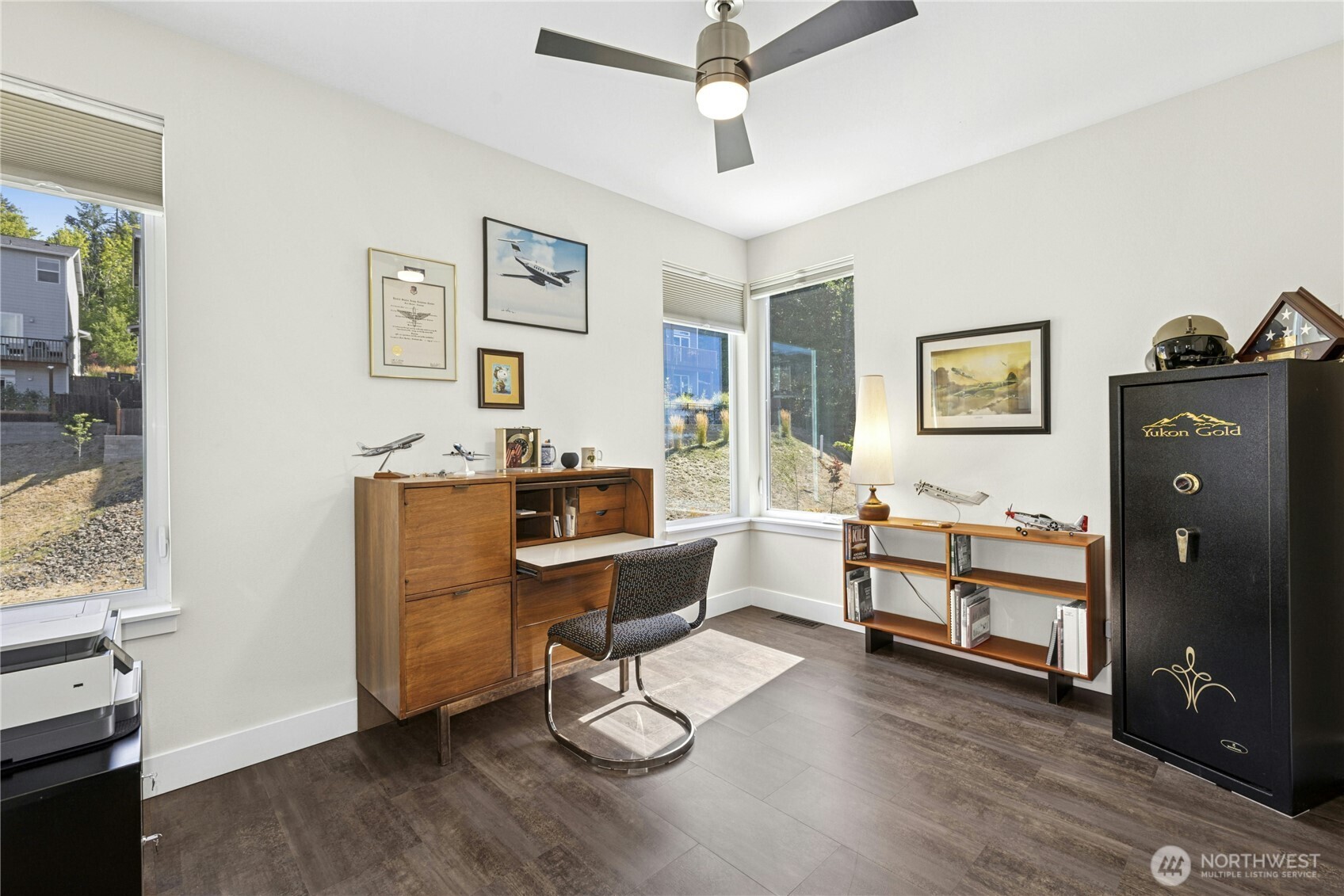 3347 Amak Lane Bremerton, WA 98310 - Photo 13 of 36 a work room with furniture and wooden floor
