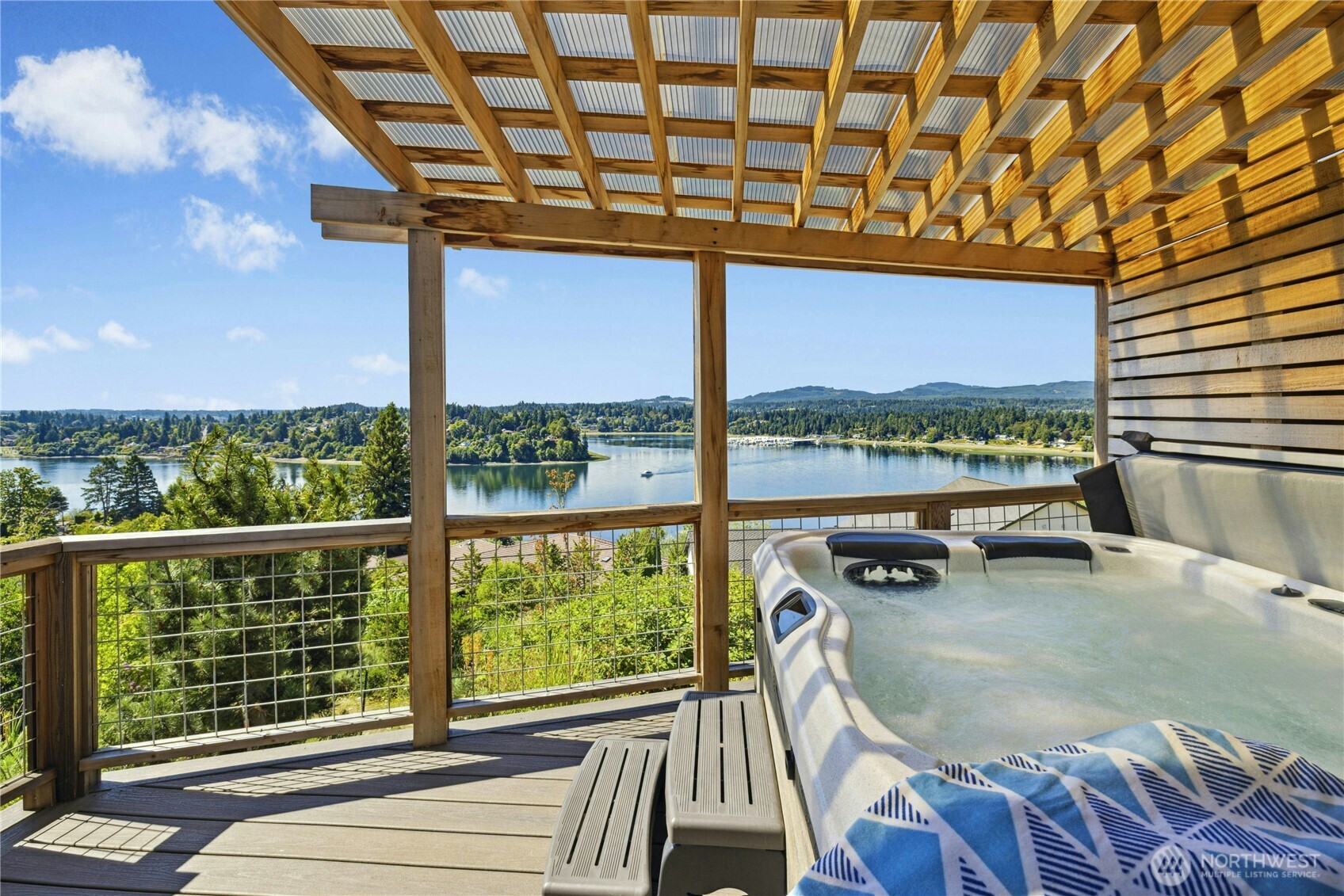 3347 Amak Lane Bremerton, WA 98310 - Photo 27 of 36 a view of a patio with a table and chairs