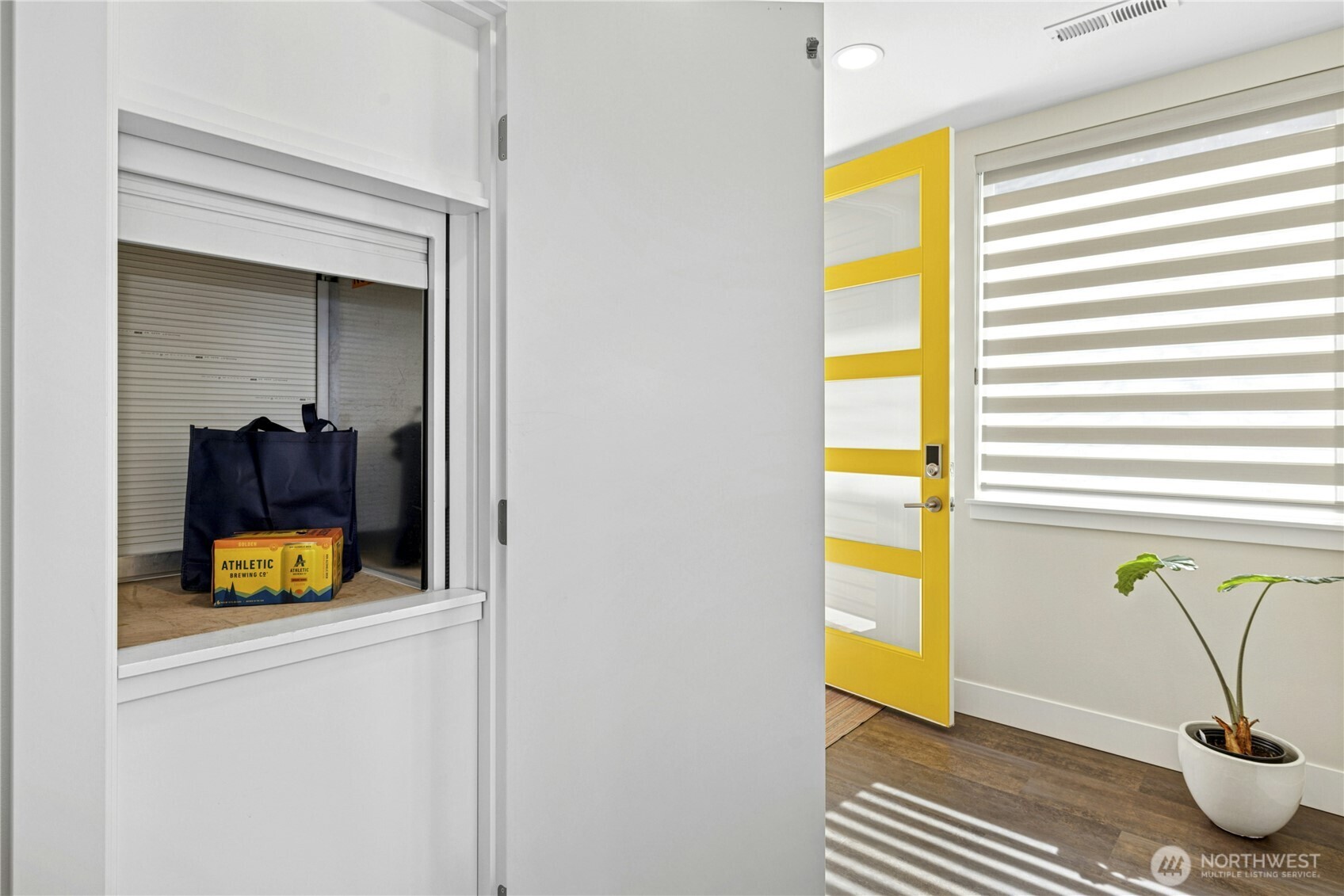 3347 Amak Lane Bremerton, WA 98310 - Photo 29 of 36 a view of walk in closet with living room and windows