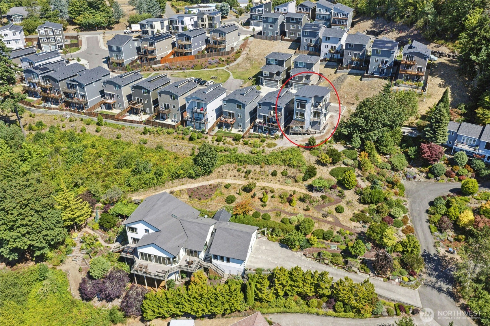 3347 Amak Lane Bremerton, WA 98310 - Photo 32 of 36 an aerial view of residential house with outdoor space and trees all around