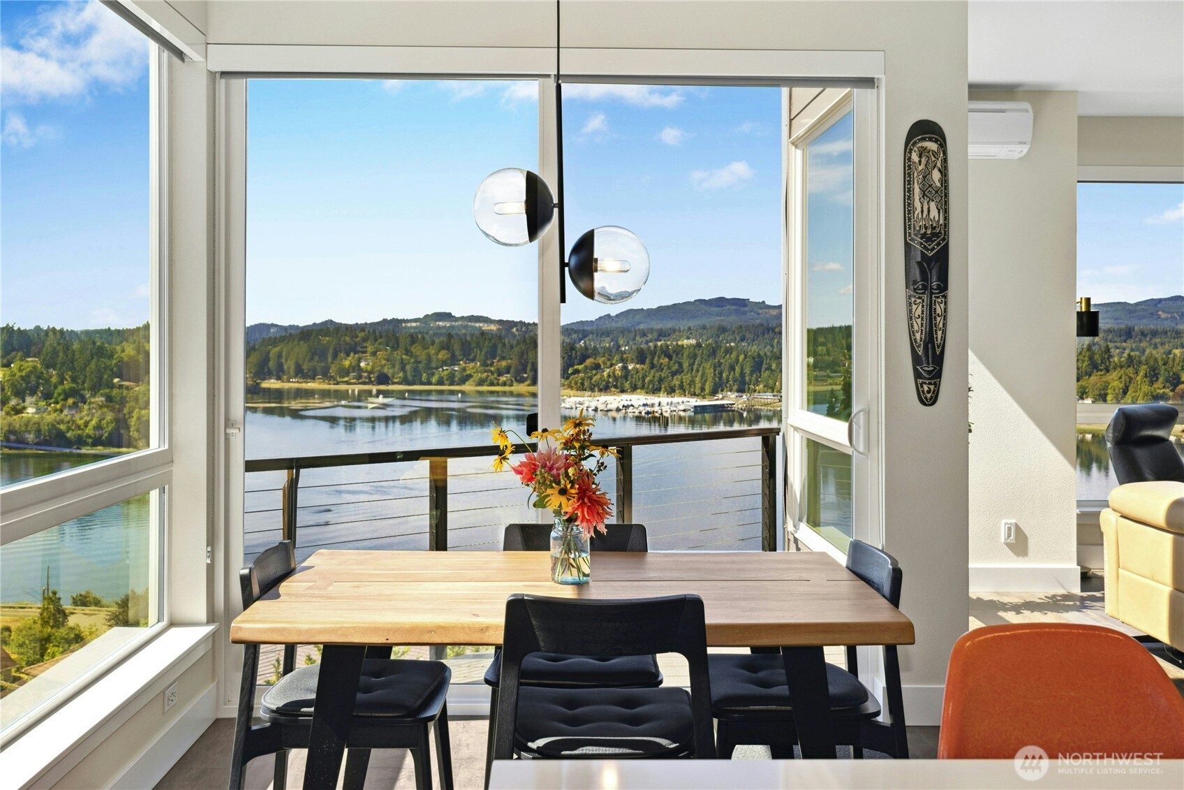 3347 Amak Lane Bremerton, WA 98310 - Photo 4 of 36 a view of a dining room with furniture window and wooden floor