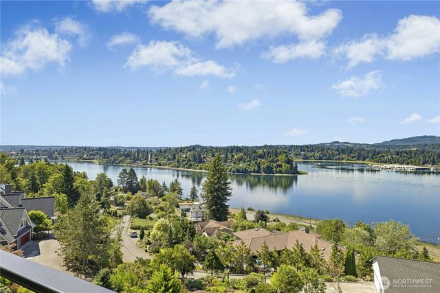 a view of a lake with a city