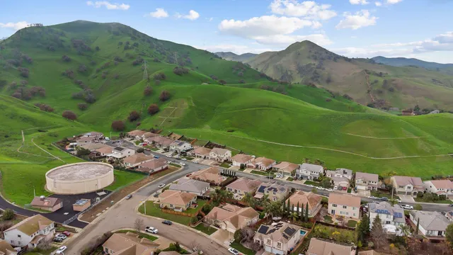 a view of a sink and table in the house