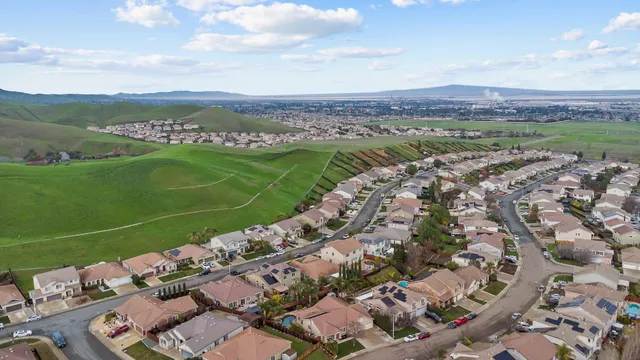 a view of a city with mountains in the background