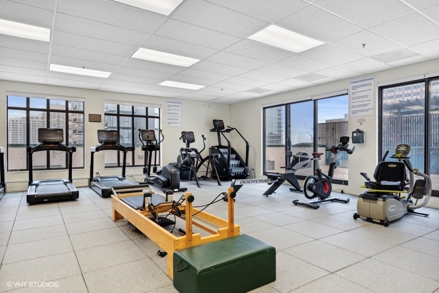 55 West Delaware Place, Unit 415 Chicago, IL 60610 - Photo 39 of 41 a view of a room with gym equipment