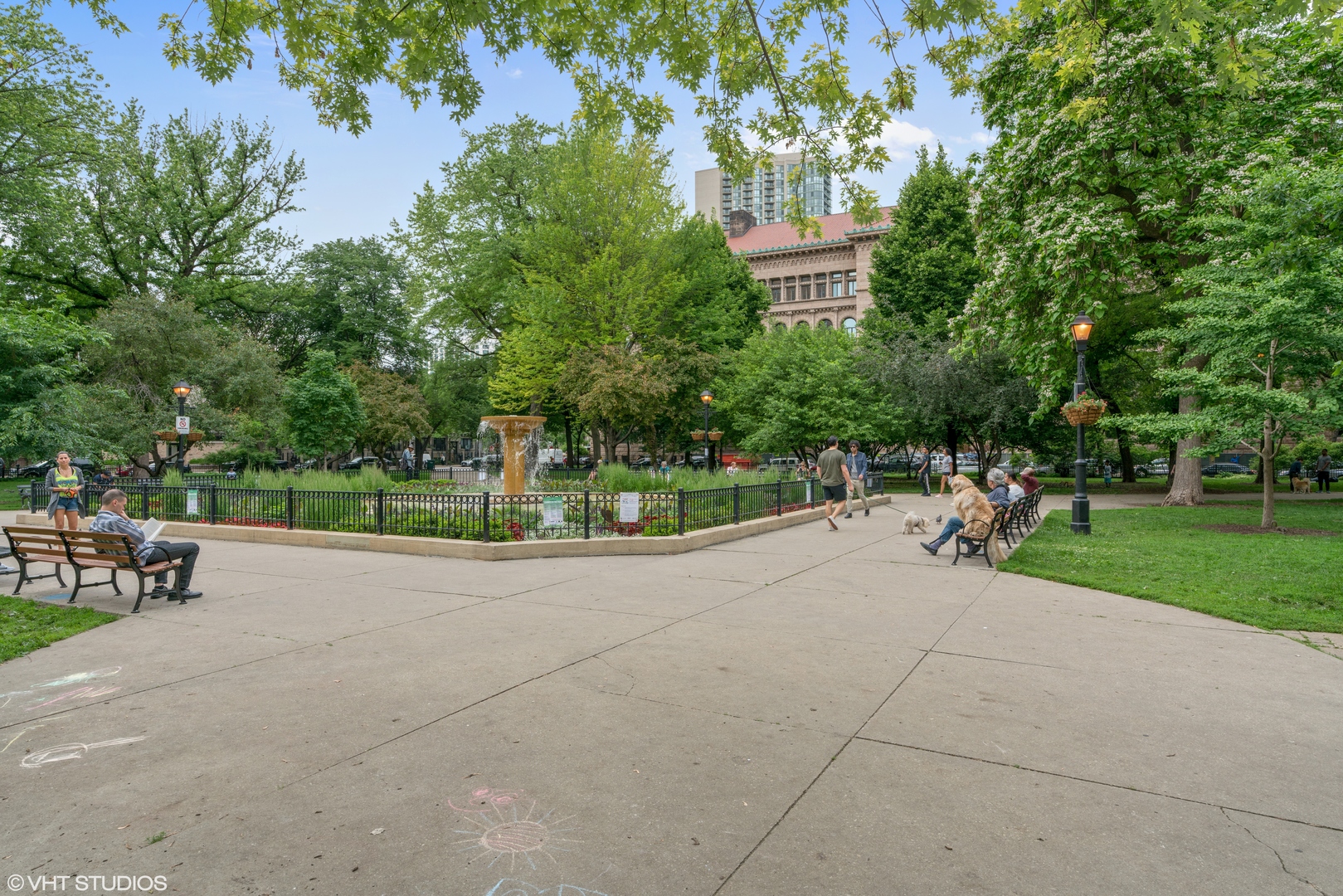 55 West Delaware Place, Unit 415 Chicago, IL 60610 - Photo 40 of 41 a park view with a bench and trees